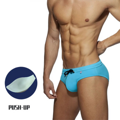 a hot man in light blue Men's Ass First Aid Swim Briefs with pad - pridevoyageshop.com - gay men’s sexy swim briefs, trunks, board shorts, and bikinis