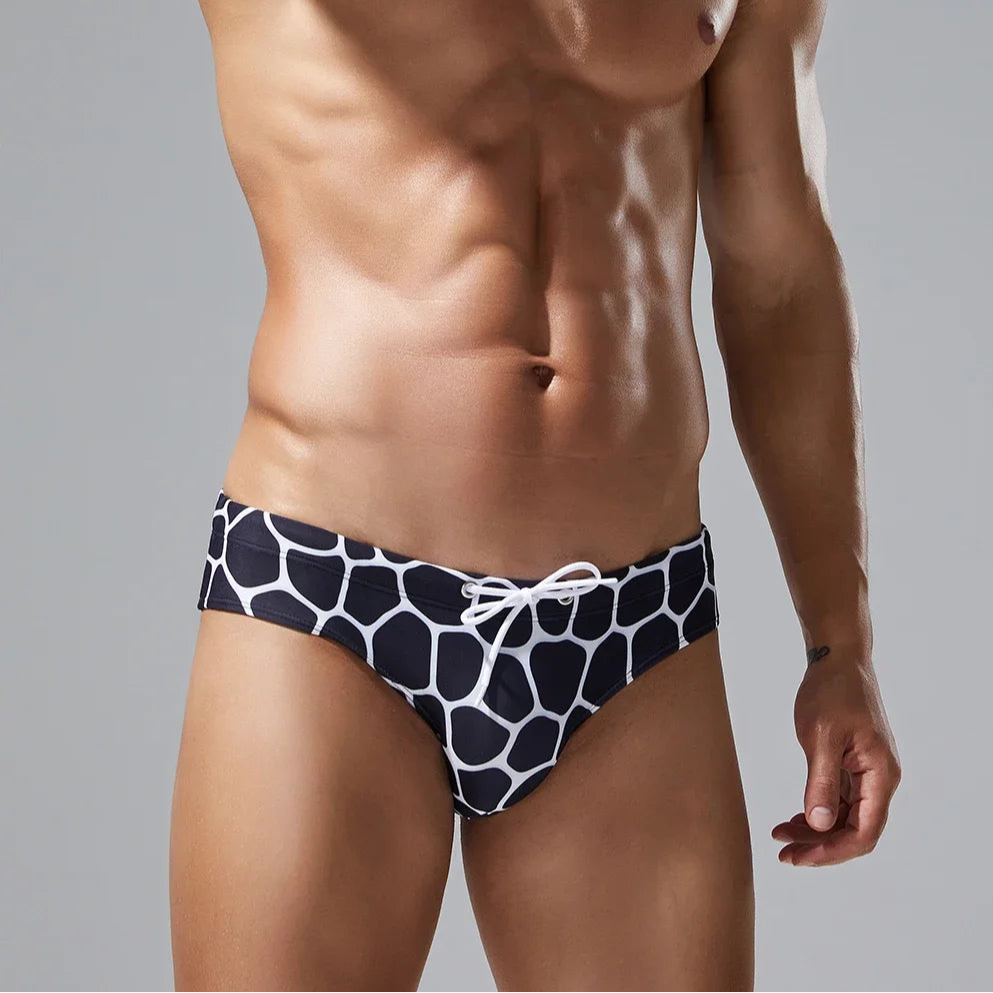 a sex man in black Men’s Hex Mesh Swim Briefs - pridevoyageshop.com - gay men’s sexy swim briefs, trunks, board shorts, and bikinis