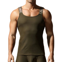a sexy man in Army Green Muscle Mary Ribbed Strap Top - pridevoyageshop.com - gay men's fashion, clubwear, party outfit
