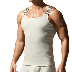 a sexy man in Beige White Muscle Mary Ribbed Strap Top - pridevoyageshop.com - gay men's fashion, clubwear, party outfit
