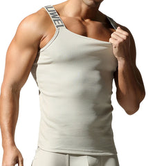 a sexy man in Beige White Muscle Mary Ribbed Strap Top - pridevoyageshop.com - gay men's fashion, clubwear, party outfit
