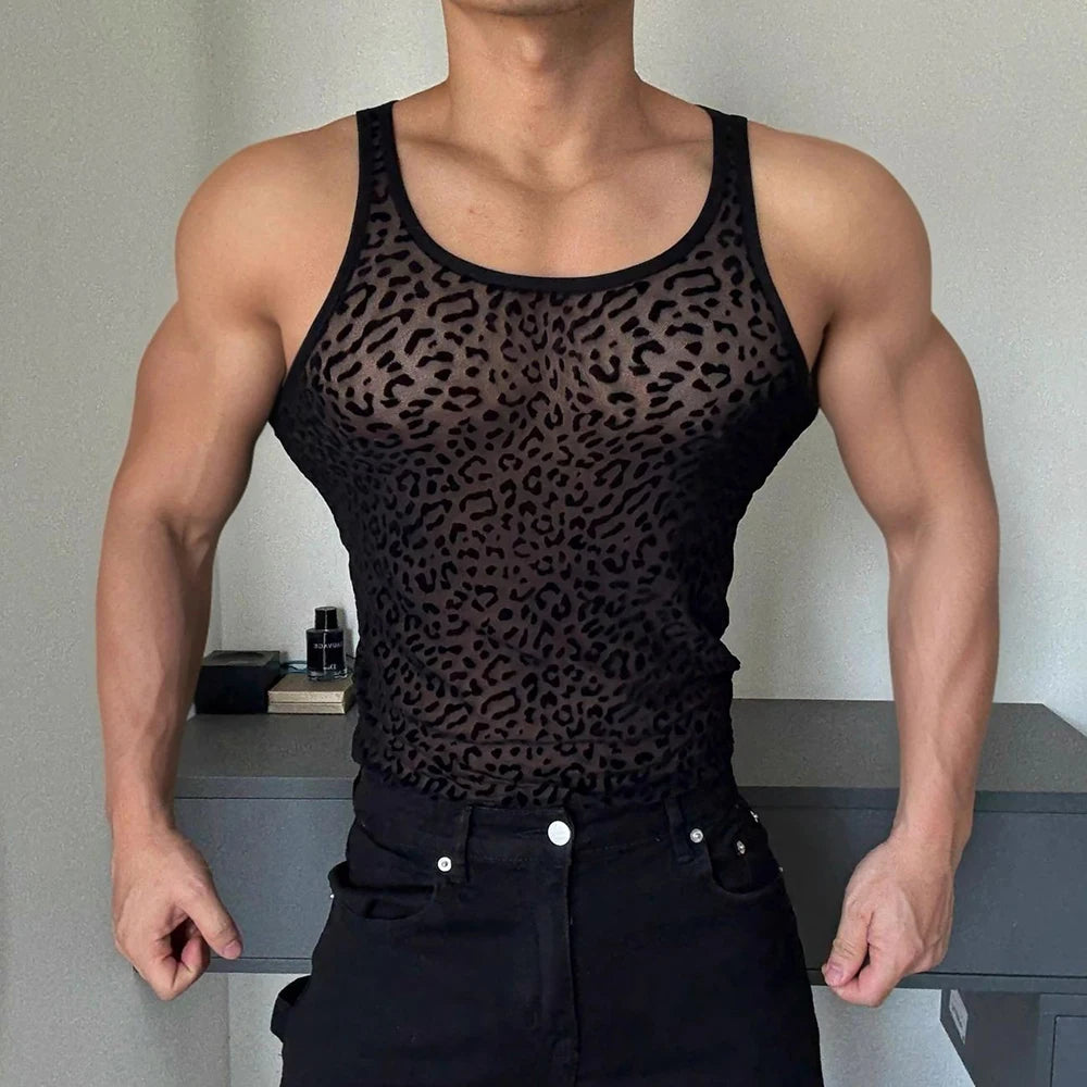 a sexy man in Black After Dark Panther Mesh Tank - pridevoyageshop.com - gay men's fashion, clubwear, party outfit
