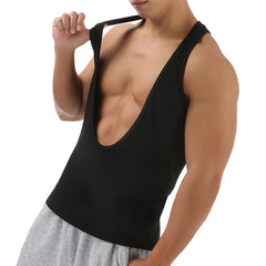 a sexy man in Black Discipline Plunge Tank - pridevoyageshop.com - gay men's fashion, clubwear, party outfit
