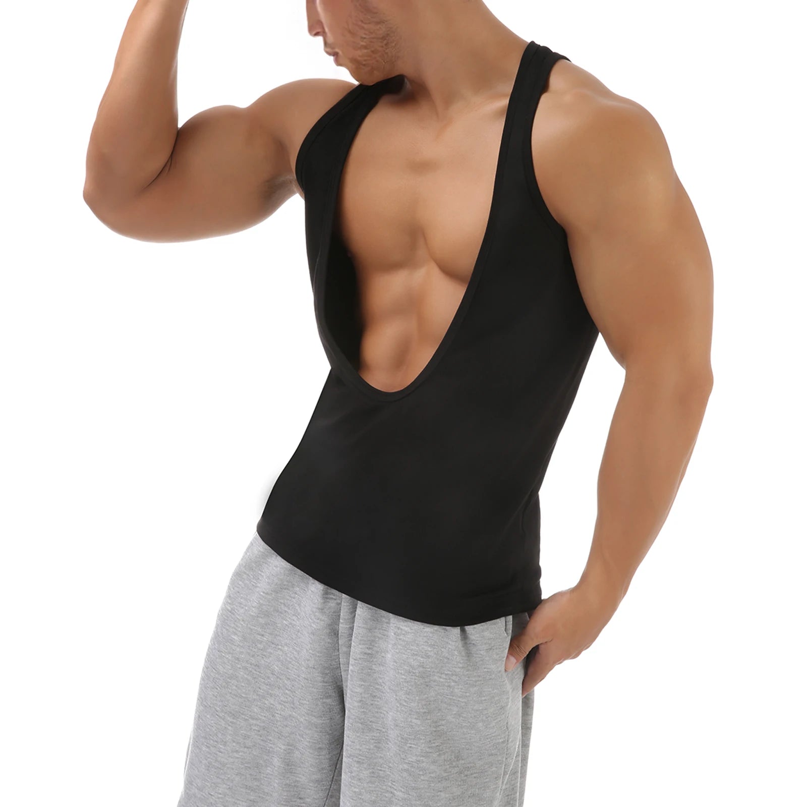 a sexy man in Black Discipline Plunge Tank - pridevoyageshop.com - gay men's fashion, clubwear, party outfit
