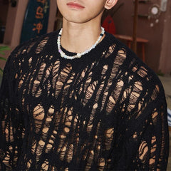 a sexy man in Black Fire Island Breeze Shred Sweater - pridevoyageshop.com - gay men's fashion, clubwear, party outfit
