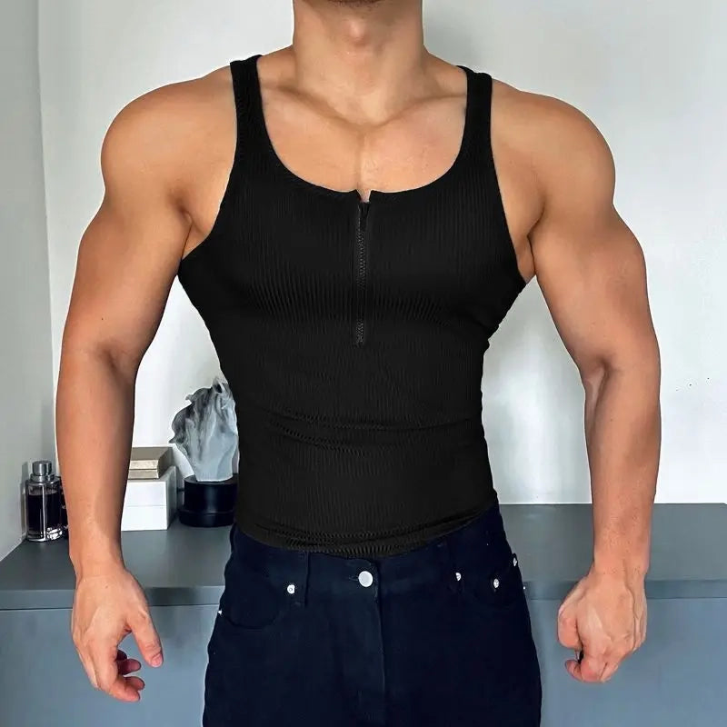a sexy man in Black Men’s Gym Glow Ribbed Zip Tank - pridevoyageshop.com - gay men's fashion, clubwear, party outfit
