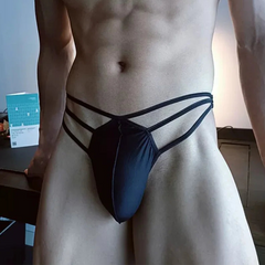 a sexy man in Black Men’s Strappy Hung Bulge Cage Thong - pridevoyageshop.com - gay men’s thongs, boxers, briefs and jockstraps