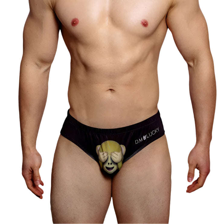 a sexy man in Black Monkey DM Men’s Cheeky Critters & Fruit Print Brief - pridevoyageshop.com - gay men’s thongs, boxers, briefs and jockstraps