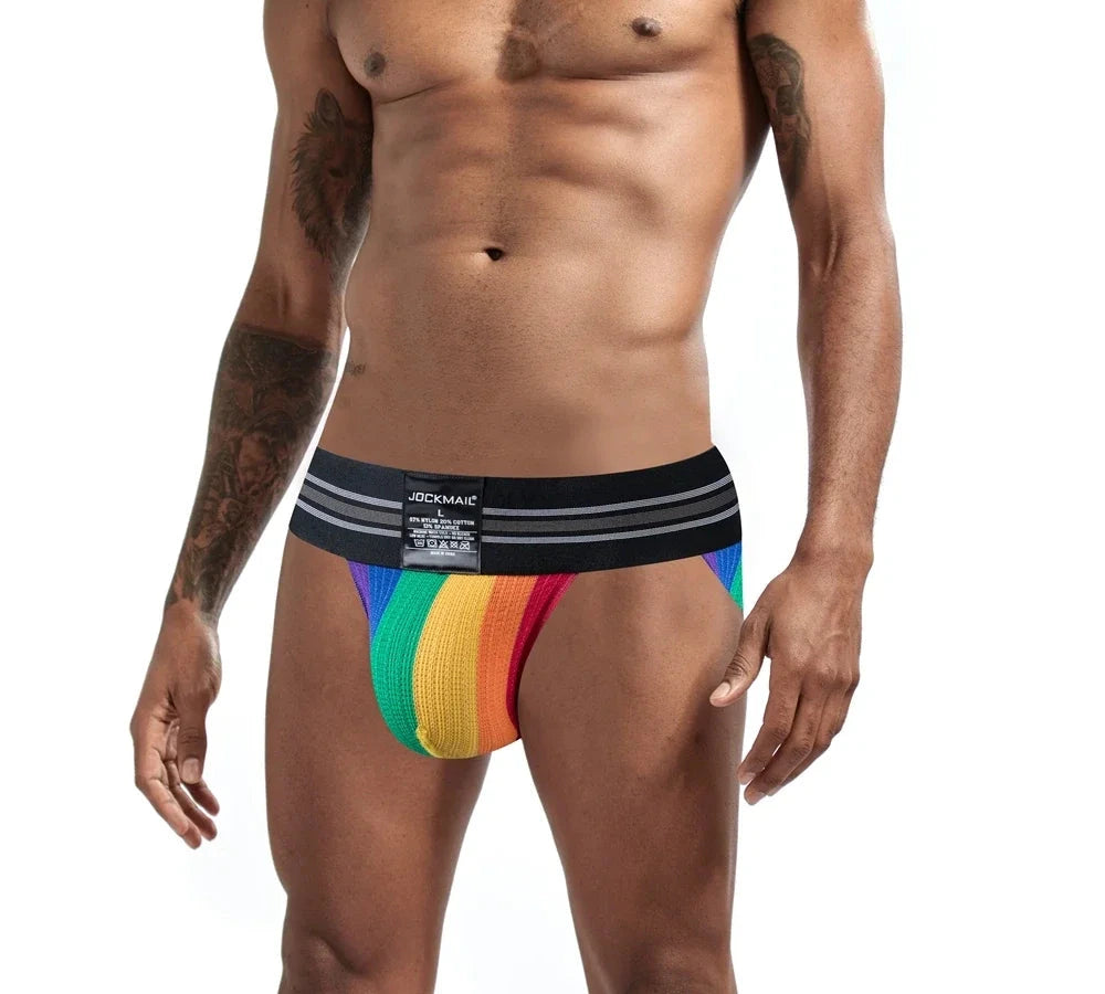 a sexy man in Black Pride Flash Bikini Brief - pridevoyageshop.com - gay men's underwear, Pride rainbow bikini