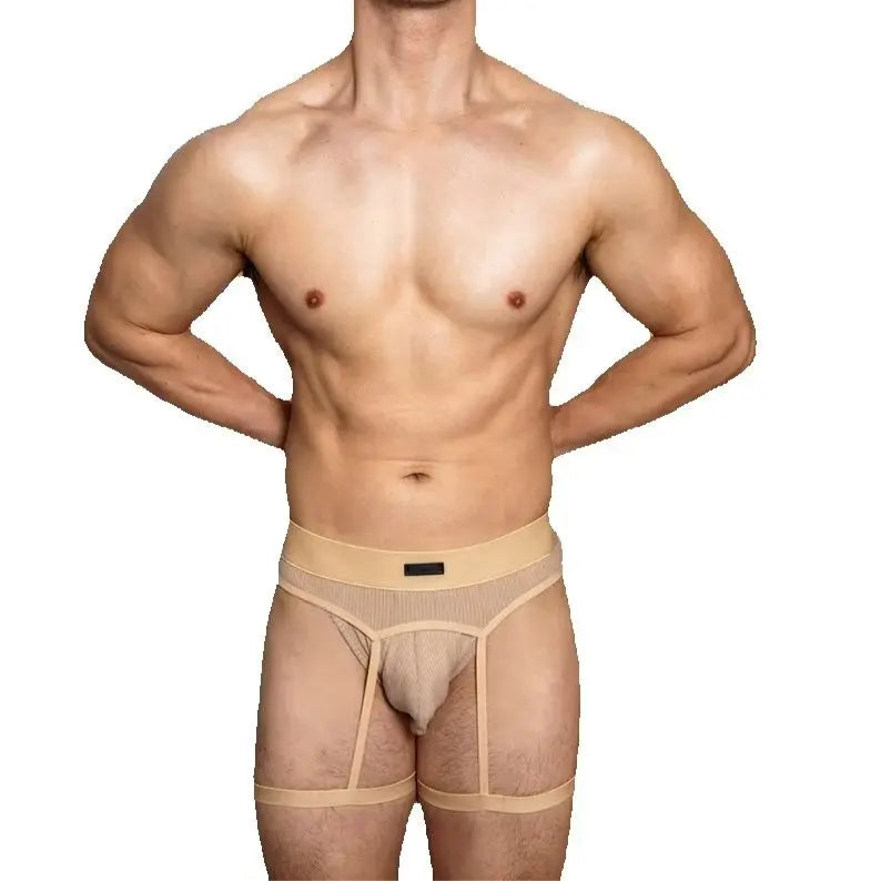 a sexy man in Champagne Men’s D.M. Garter Belt - pridevoyageshop.com - gay men’s thongs, boxers, briefs and jockstraps