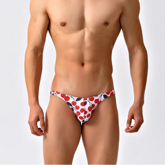 a sexy man in Cherry Tease Men’s Red Light Marina Mesh Bikini Swim Briefs - pridevoyageshop.com - gay men’s sexy swim briefs, trunks, board shorts, and bikinis