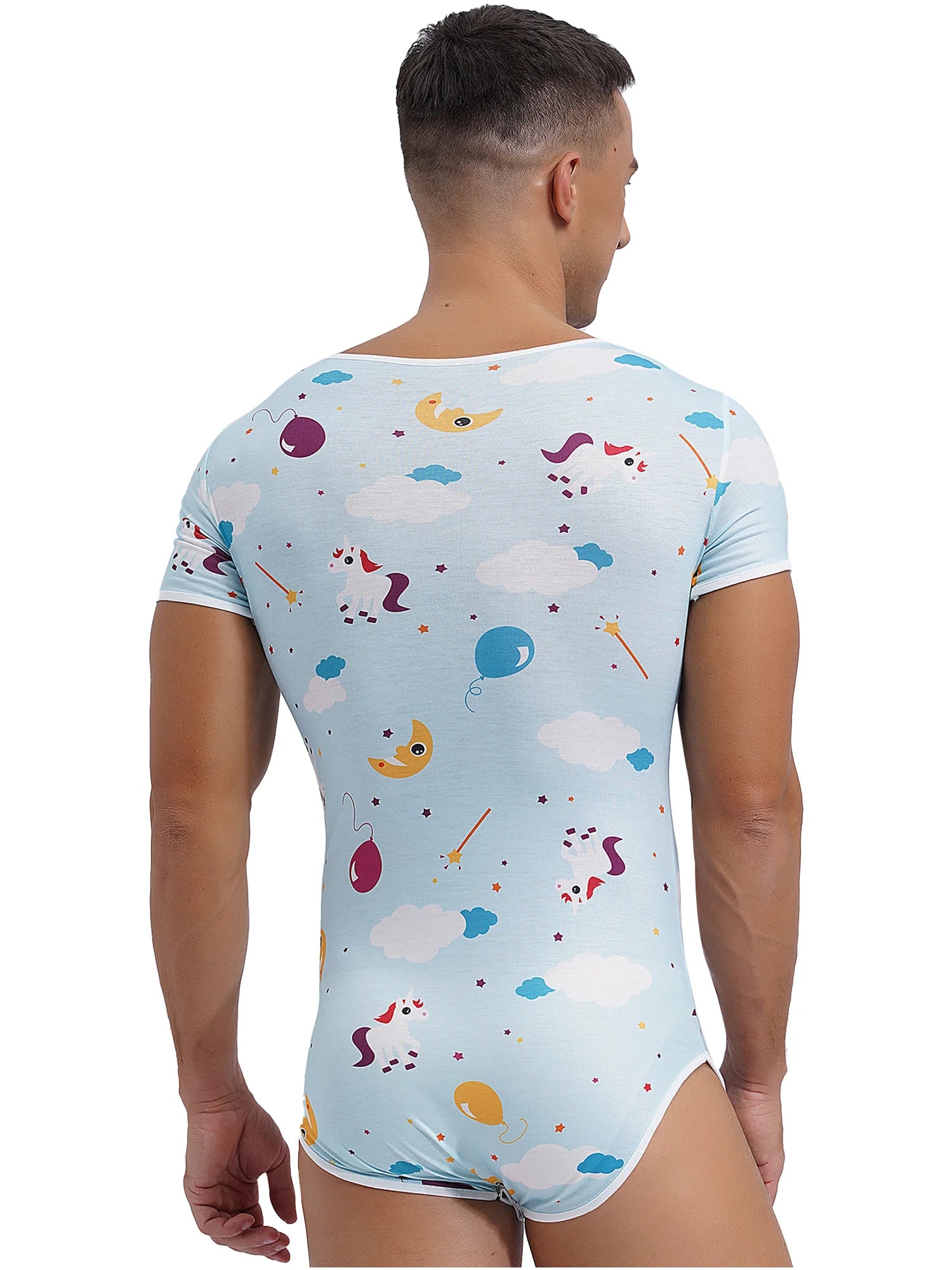 a sexy man in Cuddly Chaos Daddy’s Boy Printed Onesie, colorful silly print, tight playful silhouette, flirty boy energy – pridevoyageshop.com – gay men’s harness, lingerie and fetish wear