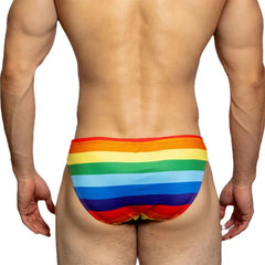 a sexy man in DESMIIT LGBT Rainbow Swim Briefs - pridevoyageshop.com - gay men’s sexy swim briefs, trunks, board shorts, and bikinis