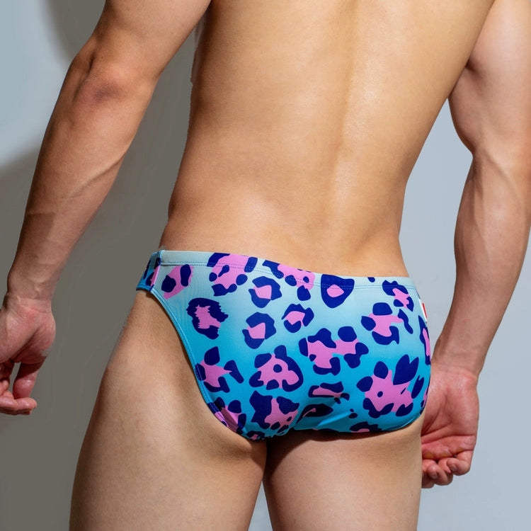 a sexy man in DM Men’s Cattitude Swim Briefs - pridevoyageshop.com - gay men’s sexy swim briefs, trunks, board shorts, and bikinis