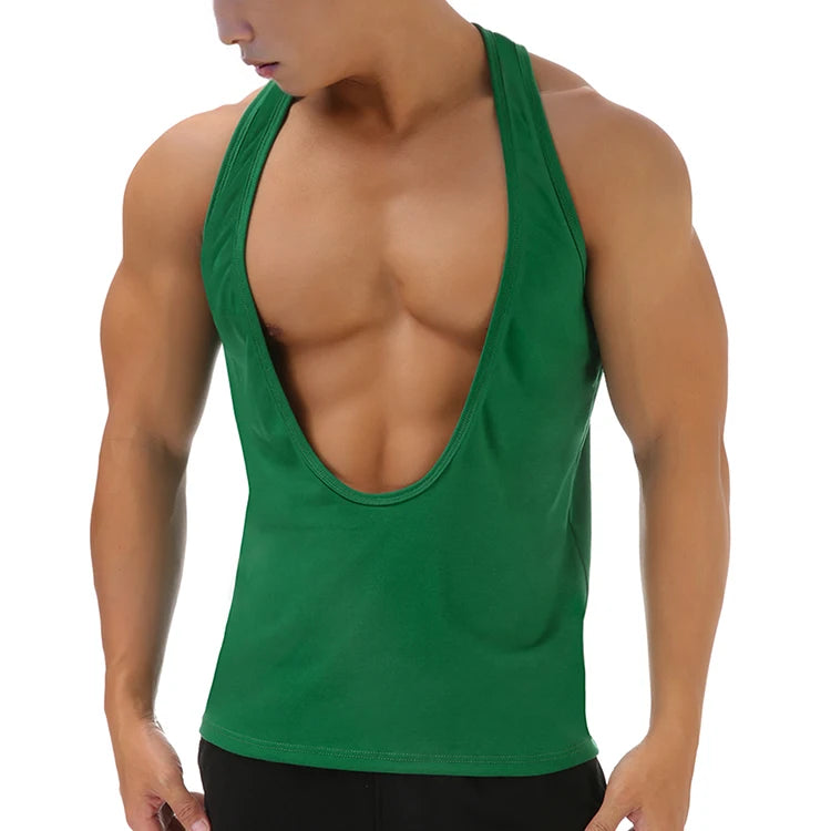 a sexy man in Dark green Discipline Plunge Tank - pridevoyageshop.com - gay men's fashion, clubwear, party outfit
