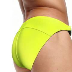 a sexy man in Fluorescent yellow Men’s Unclip Me Double Buckle Swim Briefs - pridevoyageshop.com - gay men’s sexy swim briefs, trunks, board shorts, and bikinis