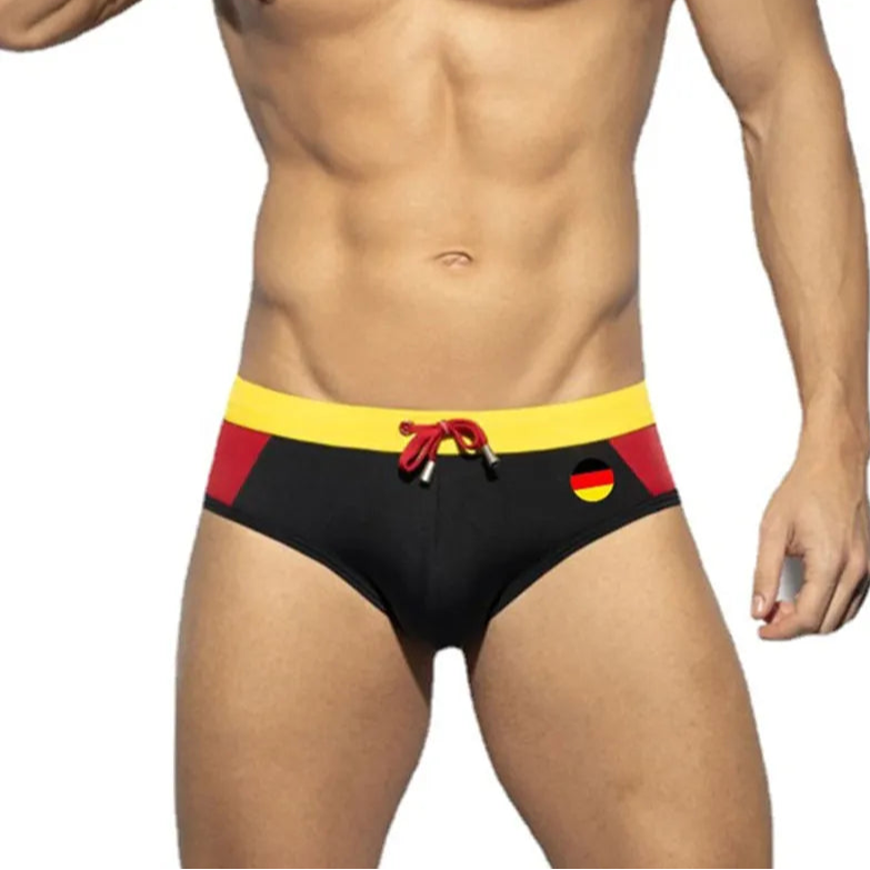 a sexy man in Germany flag Men’s World Play National Flags Swim Briefs - pridevoyageshop.com - gay men’s sexy swim briefs, trunks, board shorts, and bikinis