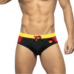 a sexy man in Germany flag Men’s World Play National Flags Swim Briefs - pridevoyageshop.com - gay men’s sexy swim briefs, trunks, board shorts, and bikinis