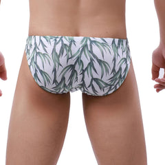 a sexy man in Green bamboo Men’s Bushy Boy Swim Briefs - pridevoyageshop.com - gay men’s sexy swim briefs, trunks, board shorts, and bikinis