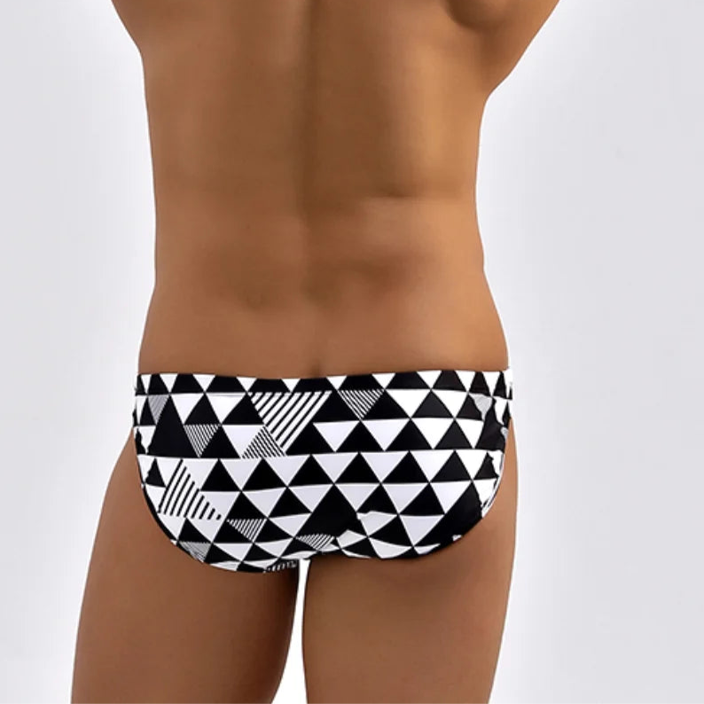 a sexy man in Men’s Black & Bi Swim Briefs - pridevoyageshop.com - gay men’s sexy swim briefs, trunks, board shorts, and bikinis