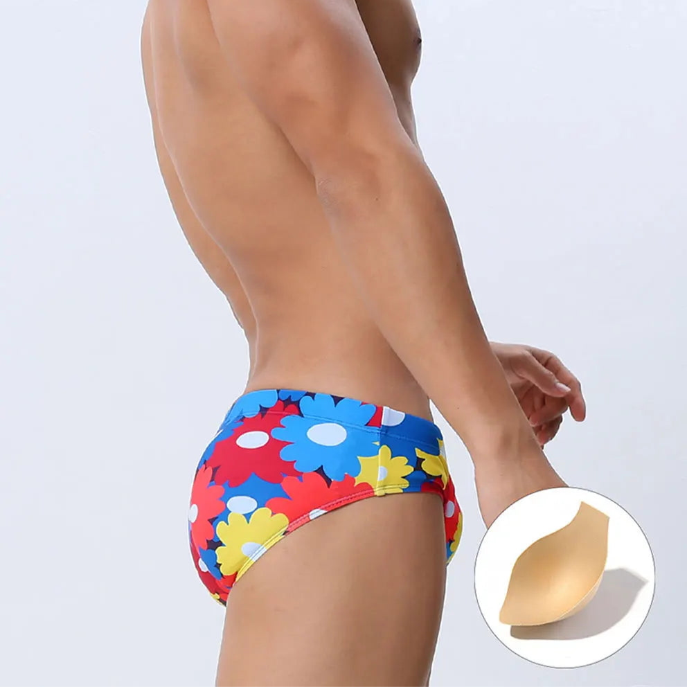 a sexy man in Men’s Bloom & Bust Swim Briefs with pad - pridevoyageshop.com - gay men’s sexy swim briefs, trunks, board shorts, and bikinis
