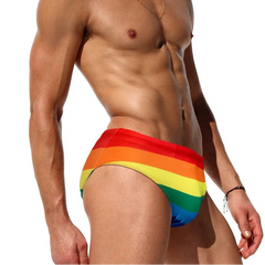 a sexy man in Men's Bottom of the Rainbow Swim Briefs - pridevoyageshop.com - gay men’s sexy swim briefs, trunks, board shorts, and bikinis