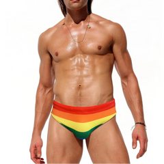 a sexy man in Men's Bottom of the Rainbow Swim Briefs - pridevoyageshop.com - gay men’s sexy swim briefs, trunks, board shorts, and bikinis