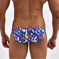 a sexy man in Men’s Buds & Butts Bikini Swim Briefs - pridevoyageshop.com - gay men’s sexy swim briefs, trunks, board shorts, and bikinis