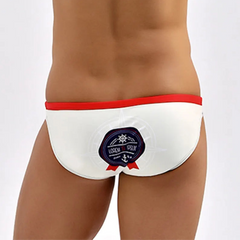 a sexy man in Men’s Captain’s Secret Lover Bikini Swim Briefs - pridevoyageshop.com - gay men’s sexy swim briefs, trunks, board shorts, and bikinis
