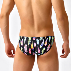 a sexy man in Men’s Colorful Feather Skinny Swim Briefs - pridevoyageshop.com - gay men’s sexy swim briefs, trunks, board shorts, and bikinis