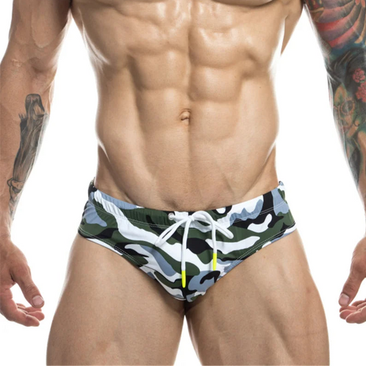a sexy man in Men’s Commando Cruisin’ Swim Briefs - pridevoyageshop.com - gay men’s sexy swim briefs, trunks, board shorts, and bikinis