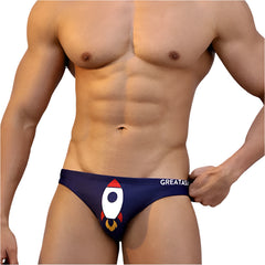a sexy man in Men’s Cosmic Orbit Micro Swim Briefs - pridevoyageshop.com - gay men’s sexy swim briefs, trunks, board shorts, and bikinis