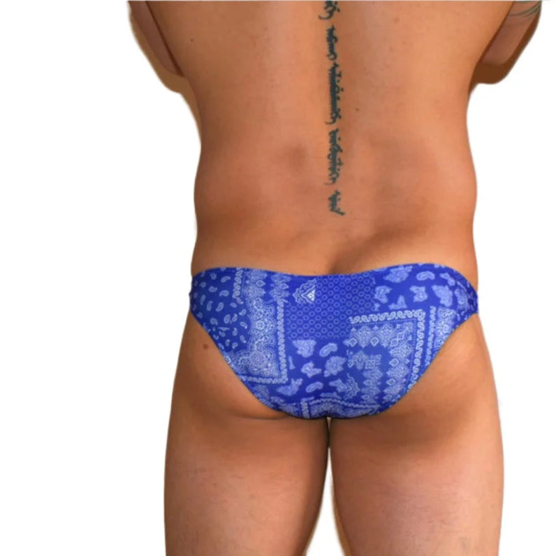 a sexy man in Men’s Deep Sea Bulge Swim Bikini Briefs - pridevoyageshop.com - gay men’s sexy swim briefs, trunks, board shorts, and bikinis