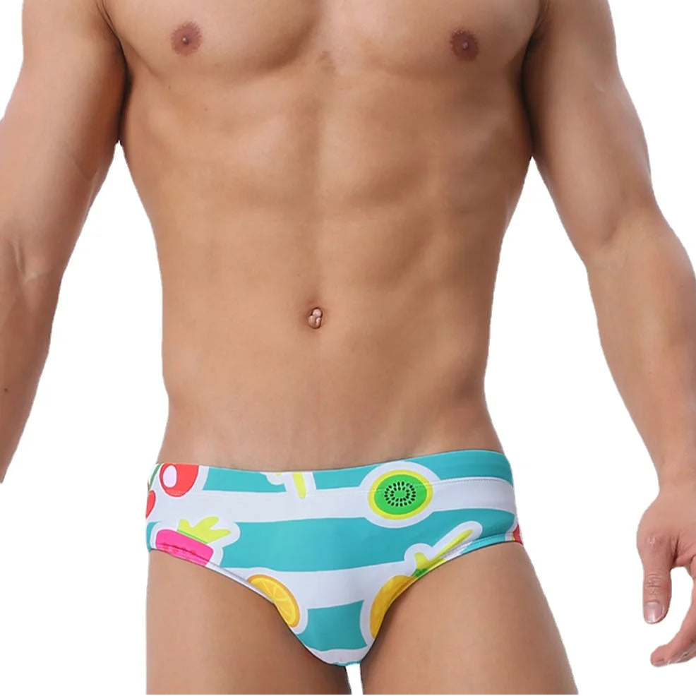 a sexy man in Men’s Fruity Fantasy Swim Briefs - pridevoyageshop.com - gay men’s sexy swim briefs, trunks, board shorts, and bikinis