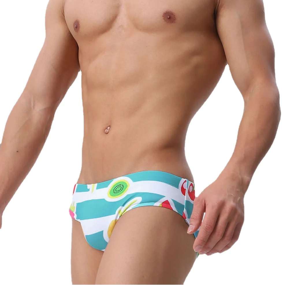 a sexy man in Men’s Fruity Fantasy Swim Briefs - pridevoyageshop.com - gay men’s sexy swim briefs, trunks, board shorts, and bikinis