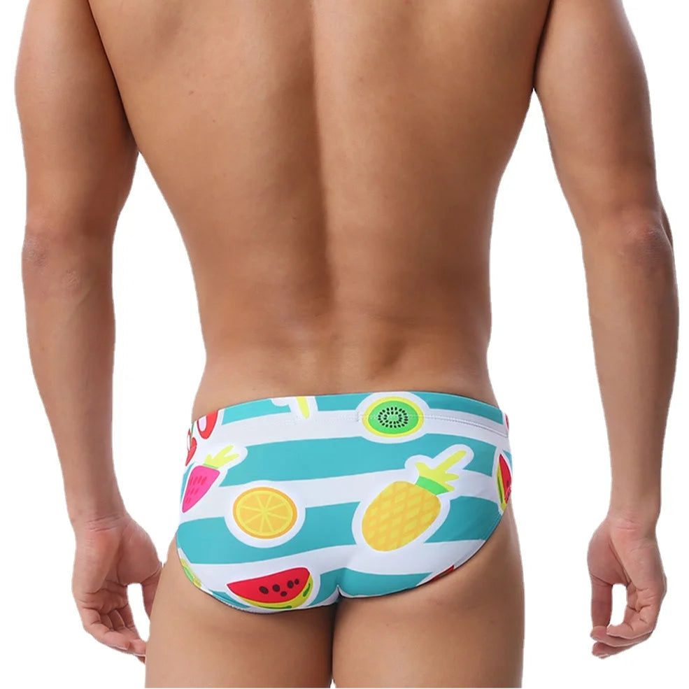a sexy man in Men’s Fruity Fantasy Swim Briefs - pridevoyageshop.com - gay men’s sexy swim briefs, trunks, board shorts, and bikinis