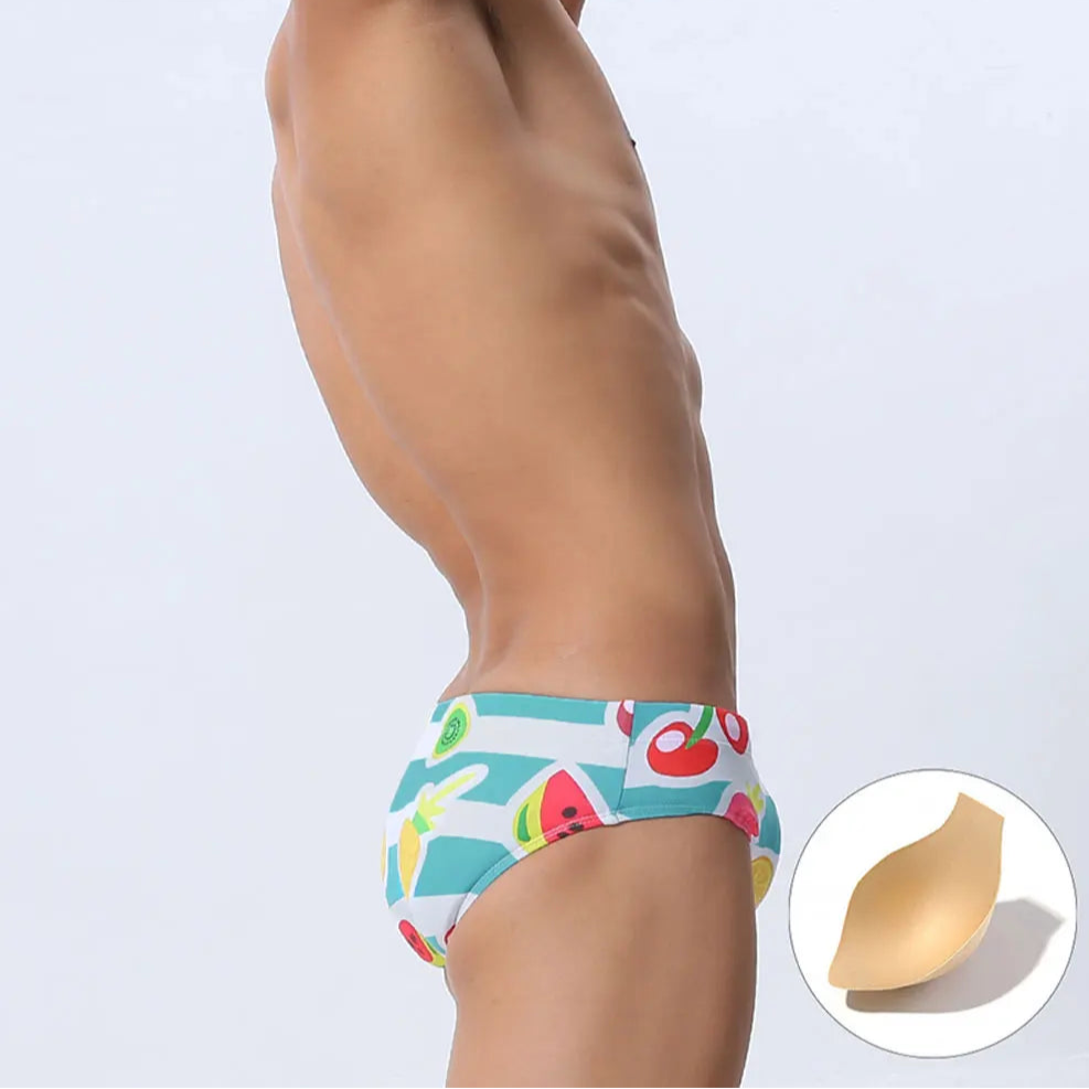 a sexy man in Men’s Fruity Fantasy Swim Briefs with pad- pridevoyageshop.com - gay men’s sexy swim briefs, trunks, board shorts, and bikinis