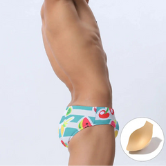 a sexy man in Men’s Fruity Fantasy Swim Briefs with pad- pridevoyageshop.com - gay men’s sexy swim briefs, trunks, board shorts, and bikinis