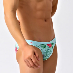 a sexy man in Men’s Hibiscus Beauty Bikini Swim Briefs - pridevoyageshop.com - gay men’s sexy swim briefs, trunks, board shorts, and bikinis