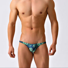 a sexy man in Men’s Hung in the Jungle Skinny Swim Briefs - pridevoyageshop.com - gay men’s sexy swim briefs, trunks, board shorts, and bikinis