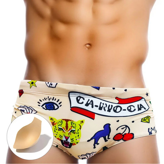 a sexy man in Men’s Lust & Luck Low Rise Swim Trunks with- pridevoyageshop.com - gay men’s sexy swim briefs, trunks, board shorts, and bikinis with pad