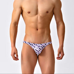 a sexy man in Men’s Mesh Matrix Bikini Swim Briefs - pridevoyageshop.com - gay men’s sexy swim briefs, trunks, board shorts, and bikinis