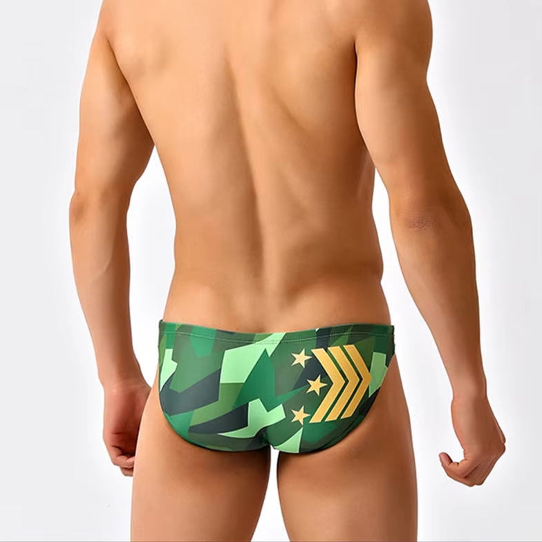 a sexy man in Men’s Military Beauty Camo Low Rise Bikini Swim Briefs - pridevoyageshop.com - gay men’s sexy swim briefs, trunks, board shorts, and bikinis