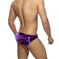 a sexy man in Men’s Neon Veins Swim Briefs - pridevoyageshop.com - gay men’s sexy swim briefs, trunks, board shorts, and bikinis