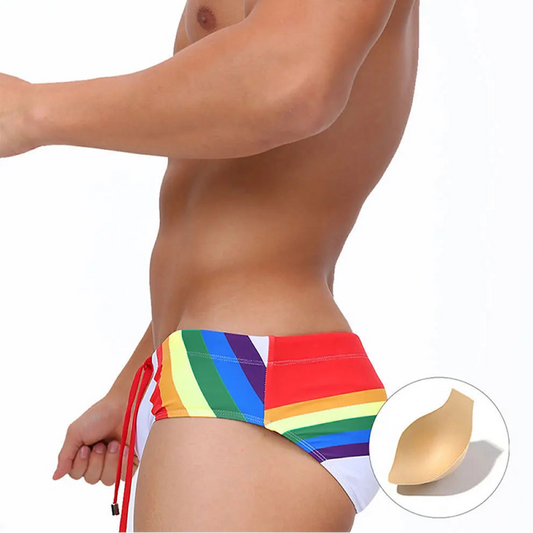 a sexy man in Men’s Pride Passion Swim Brief with Pad - pridevoyageshop.com - gay men’s sexy swim briefs, trunks, board shorts, and bikinis