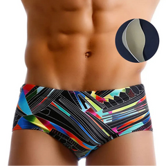 a sexy man in Men’s Pride Voltage Low Rise Swim Trunks no pad – pridevoyageshop.com – gay men’s sexy swim briefs, trunks, board shorts, and bikinis