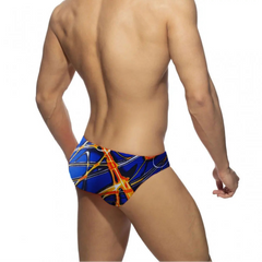 a sexy man in Men’s Sea Lava Swim Briefs - pridevoyageshop.com - gay men’s sexy swim briefs, trunks, board shorts, and bikinis