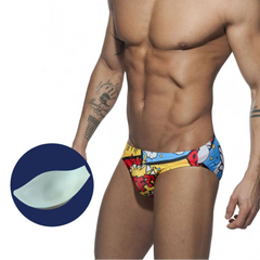 a sexy man in Men's Slap Me Swim Briefs with pad- pridevoyageshop.com - gay men’s sexy swim briefs, trunks, board shorts, and bikinis