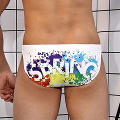 a sexy man in Men’s Spring Fling Rainbow Butt Pride Bikini Swim Briefs - pridevoyageshop.com - gay men’s sexy swim briefs, trunks, board shorts, and bikinis
