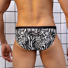 a sexy man in Men’s Sssnatch Me Snake Bikini Swim Briefs - pridevoyageshop.com - gay men’s sexy swim briefs, trunks, board shorts, and bikinis